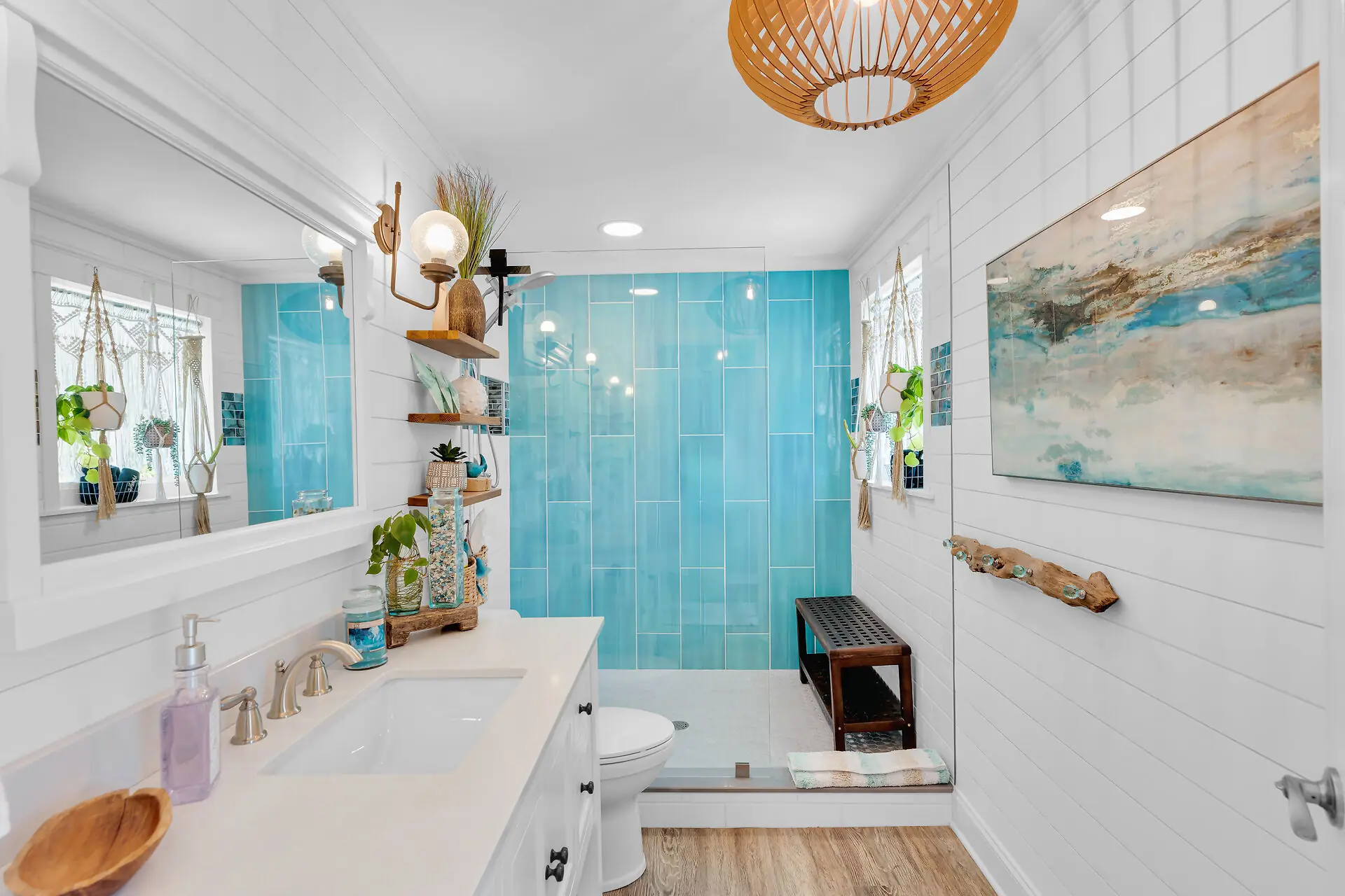 Spa-style master bathroom with a turquoise-tiled walk-in shower